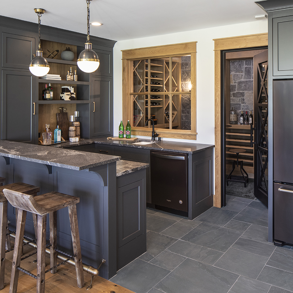 Bluestone Blue Select Leathered Tile flooring in a modern home bar and wine cellar