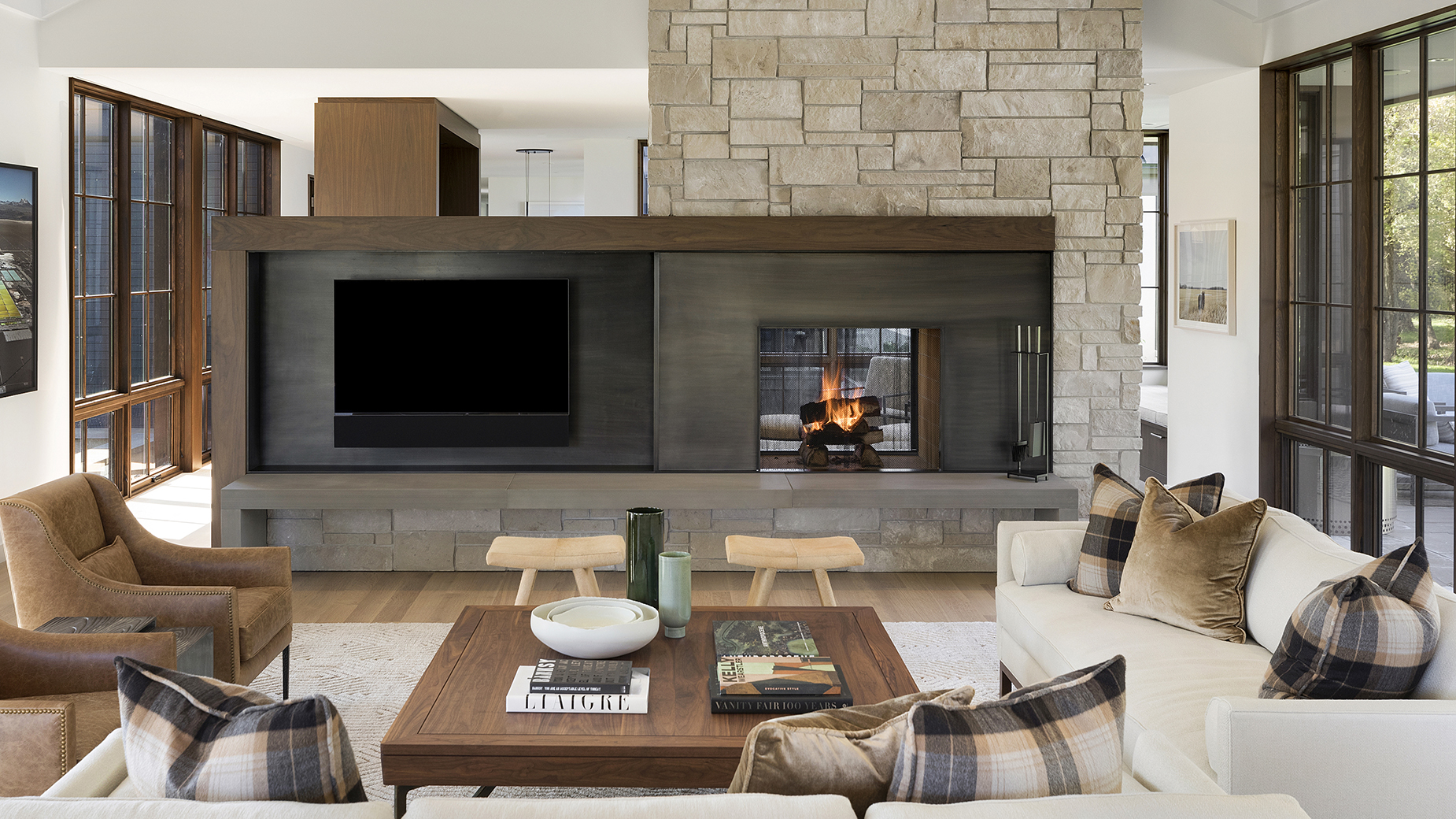 A substantial hearth anchors this fire surround, crafted in Hudson™ Sandstone. Surrounding wall features Alder™ Limestone veneer.