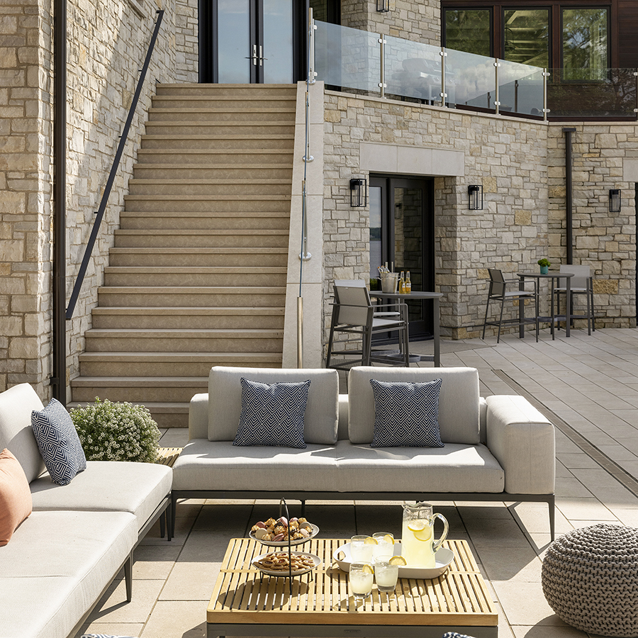 A luxurious outdoor sanctuary with Ardeo™ Limestone paving and matching custom step treads.