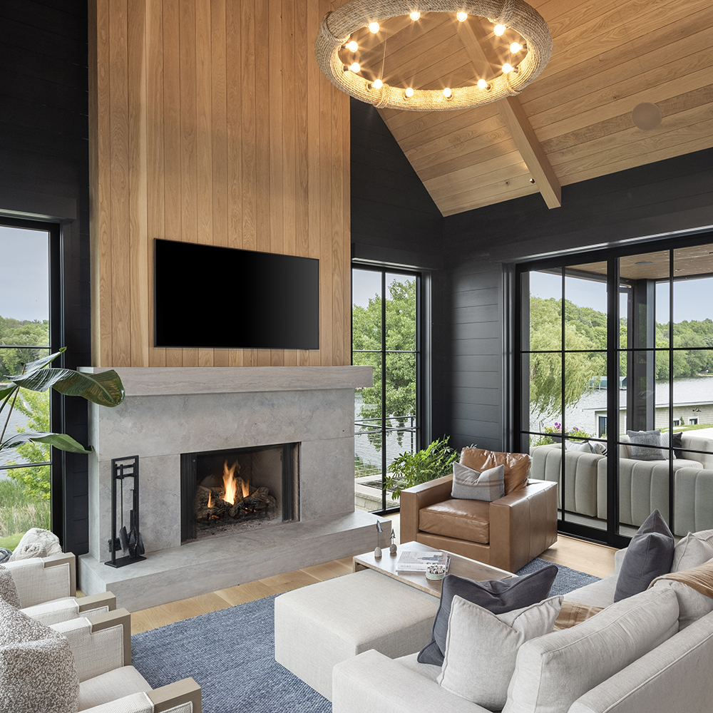 61. Barone™ Limestone fleuri-cut surround, vein-cut mantle and hearth.