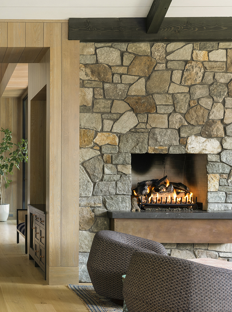 38. This Friesian™ Limestone hearth, paired with our Wolfeboro™ Granite, is the epitome of rustic modern.
