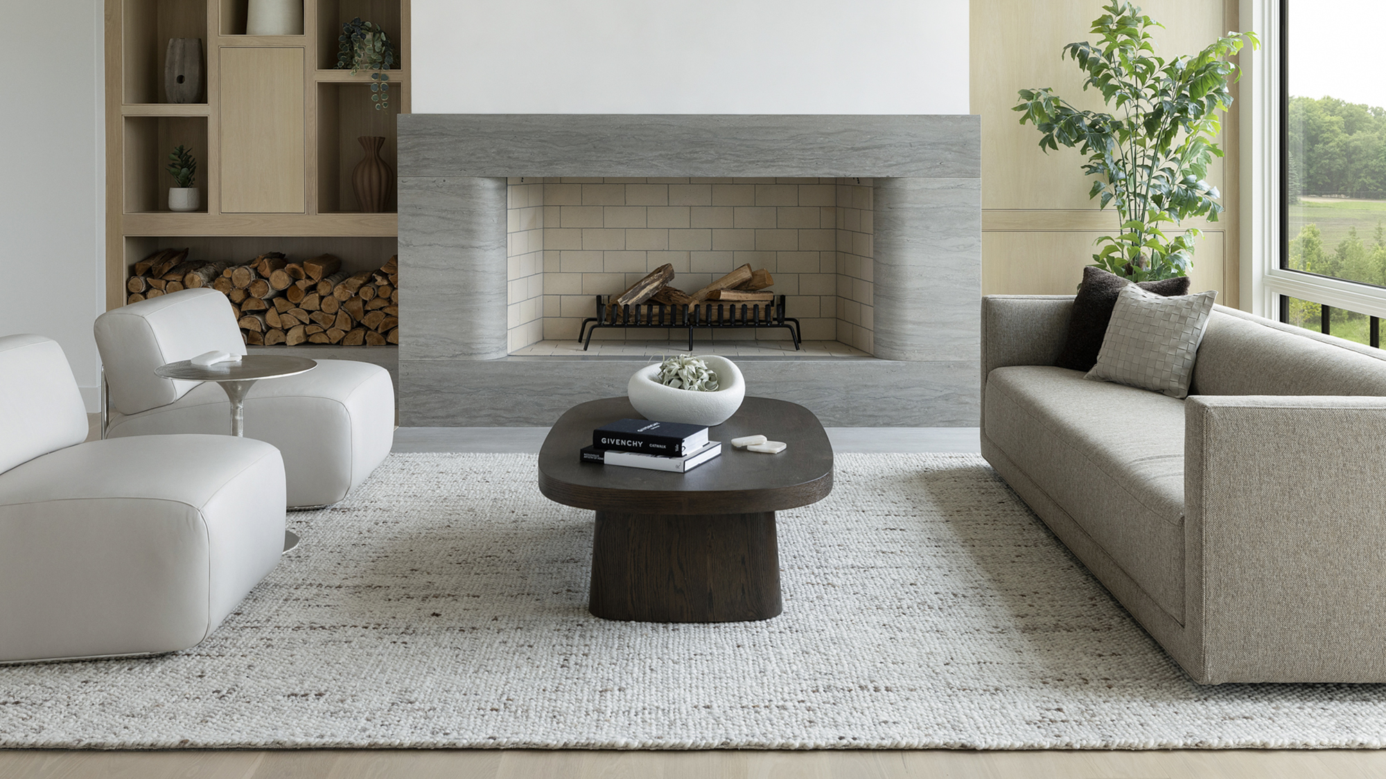 7. Sumptuous curves define this Barone™ Limestone vein-cut fire surround.