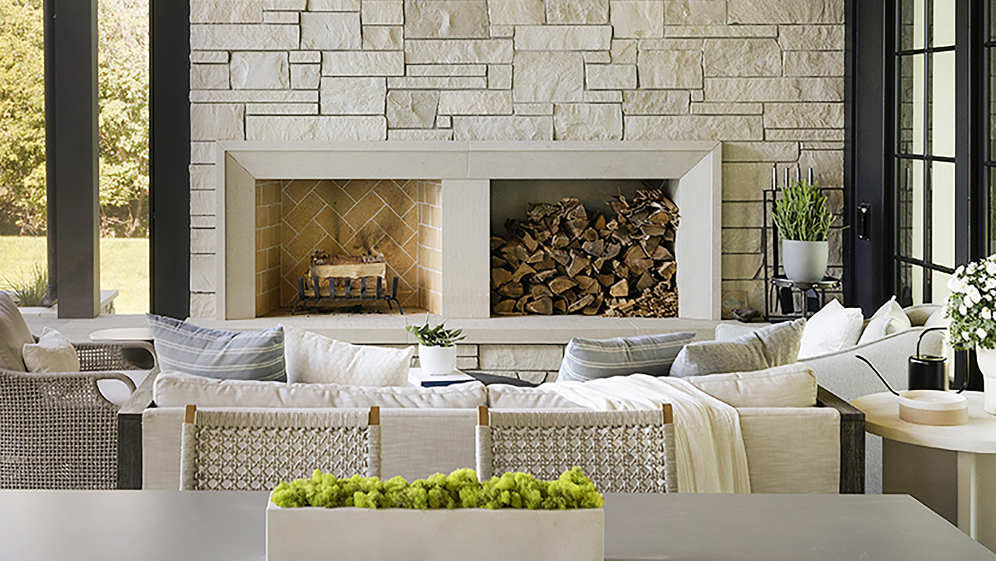 9. Double fireplace surround with substantial hearth in Limestone. Surrounding Alder™ Split Face Limestone veneer.