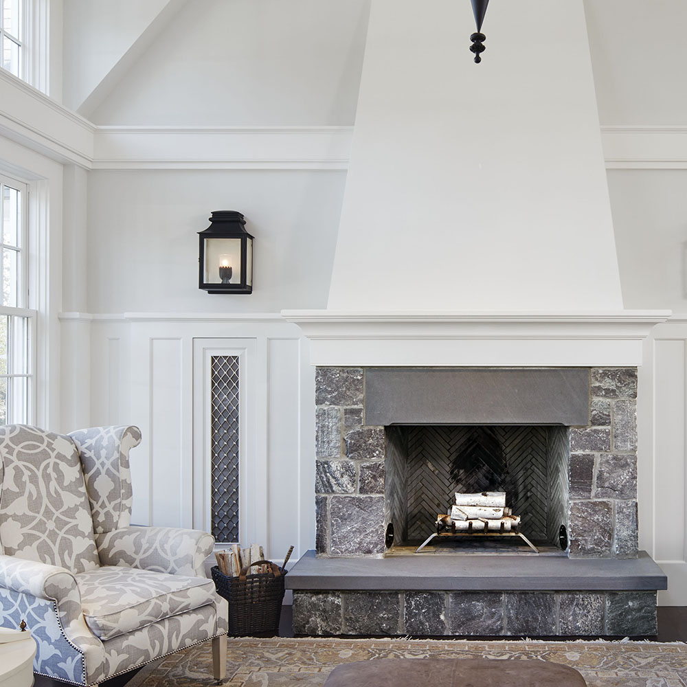 23. Coastal elegance with Bluestone Blue Select in our Cashmere™ finish for this mantel apron and hearth, paired with our Wolfeboro™ Granite veneer.
