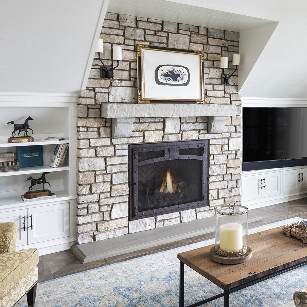 22. Chiseled and brushed Limestone mantel, Hudson™ Sandstone hearthstone, and our custom blend veneer.