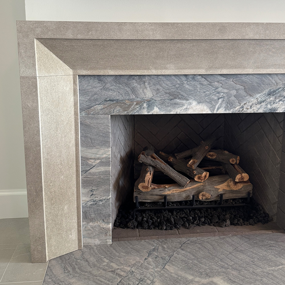 51. Gorgeous Gothic Limestone surround with contrasting inlay.