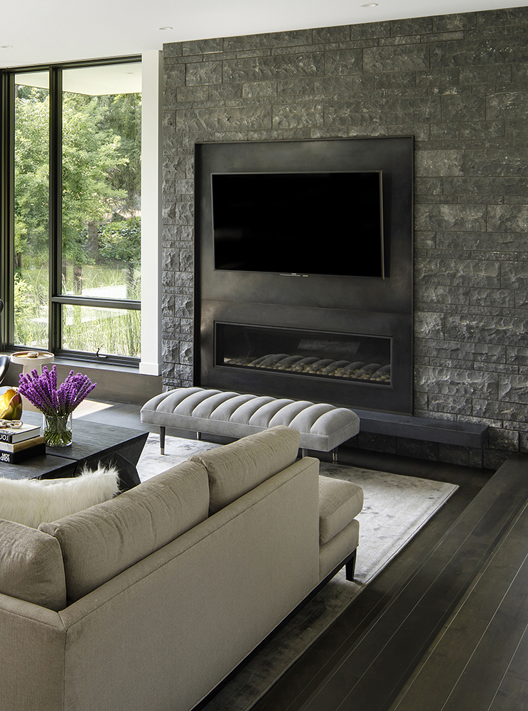 31. Fireplace insert surrounded with our Friesian™ Limestone veneer.