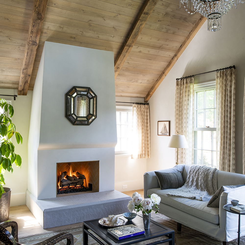 33. Vintage perfection with a master suite fire surround grounded with a Limestone hearth in Relic™ finish with an eased edge.