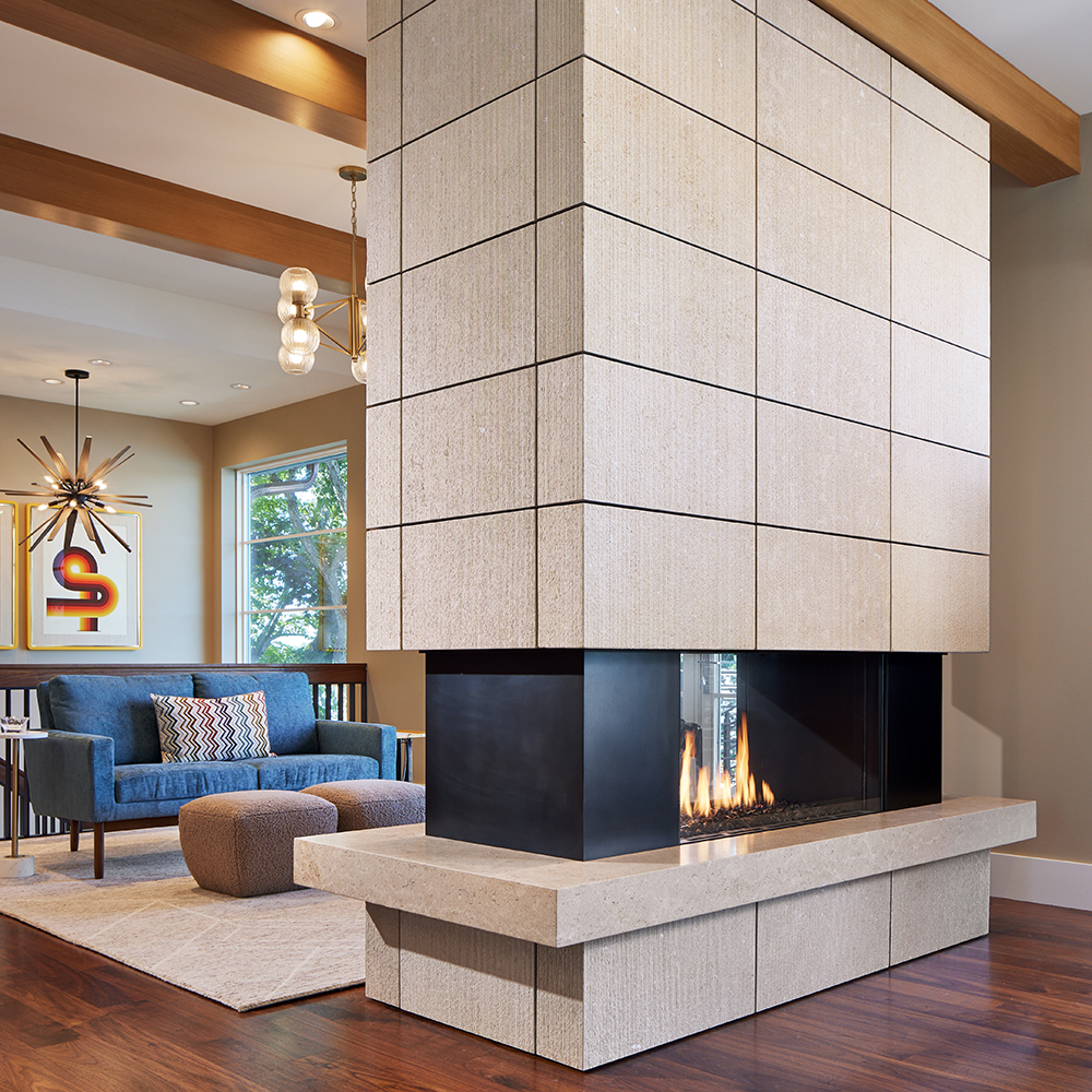 45. Monumental style in our Ardeo™ Limestone with a striated finish on panels and a honed finish on the hearth.