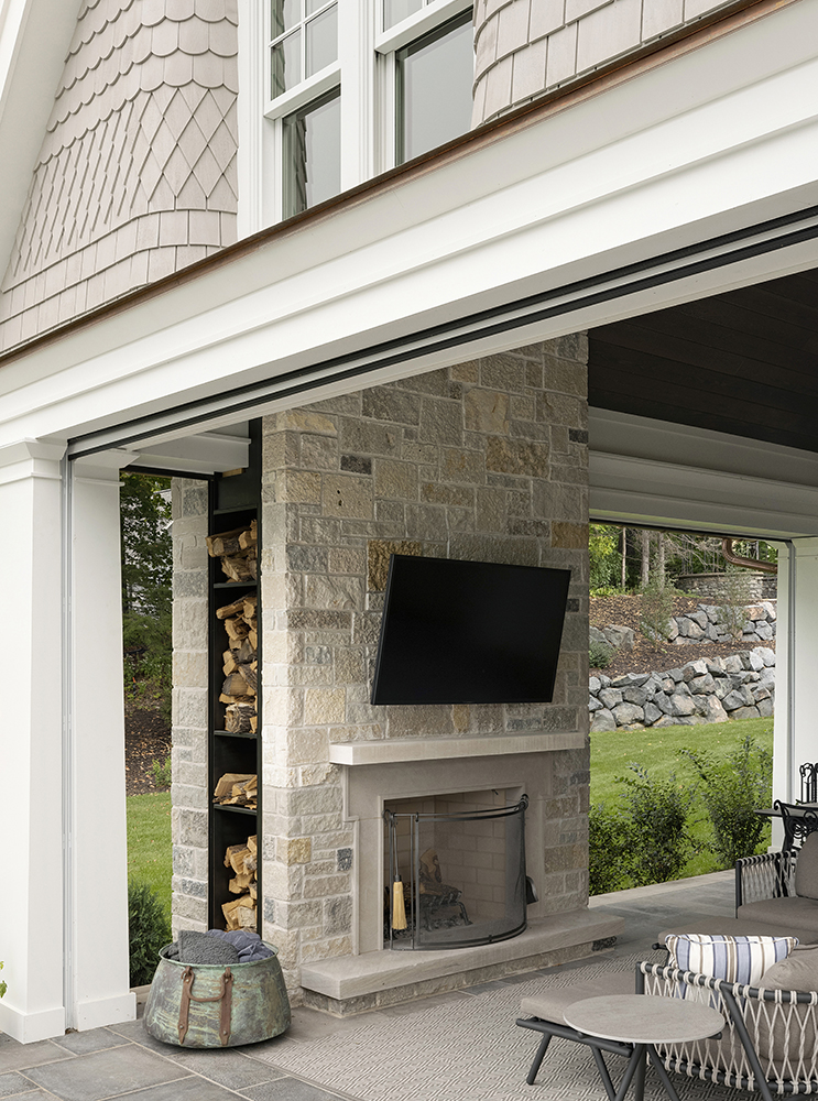 36. Custom design highlights this cherished all weather space with an Indiana Limestone surround.