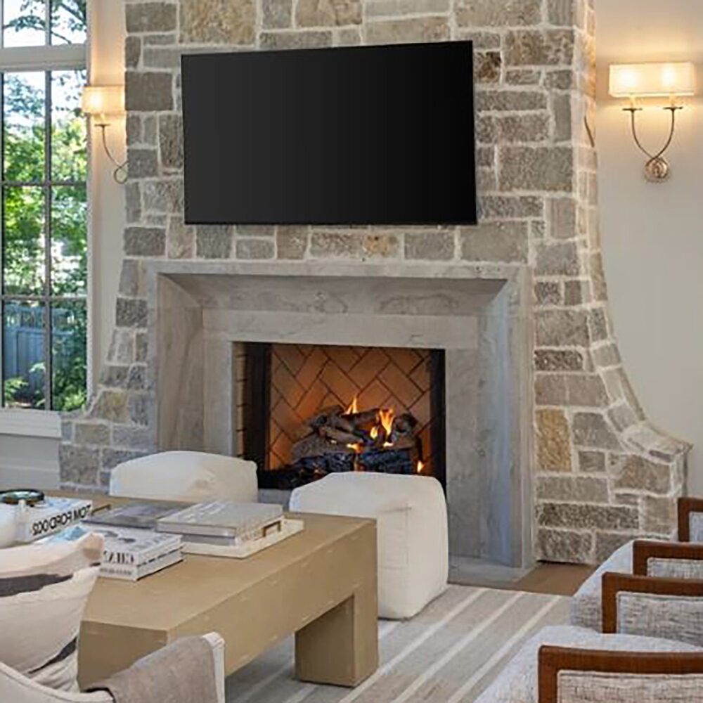 47. A charming combination of our Barone™ Limestone fire surround and Oyster™ Bay Veneer.