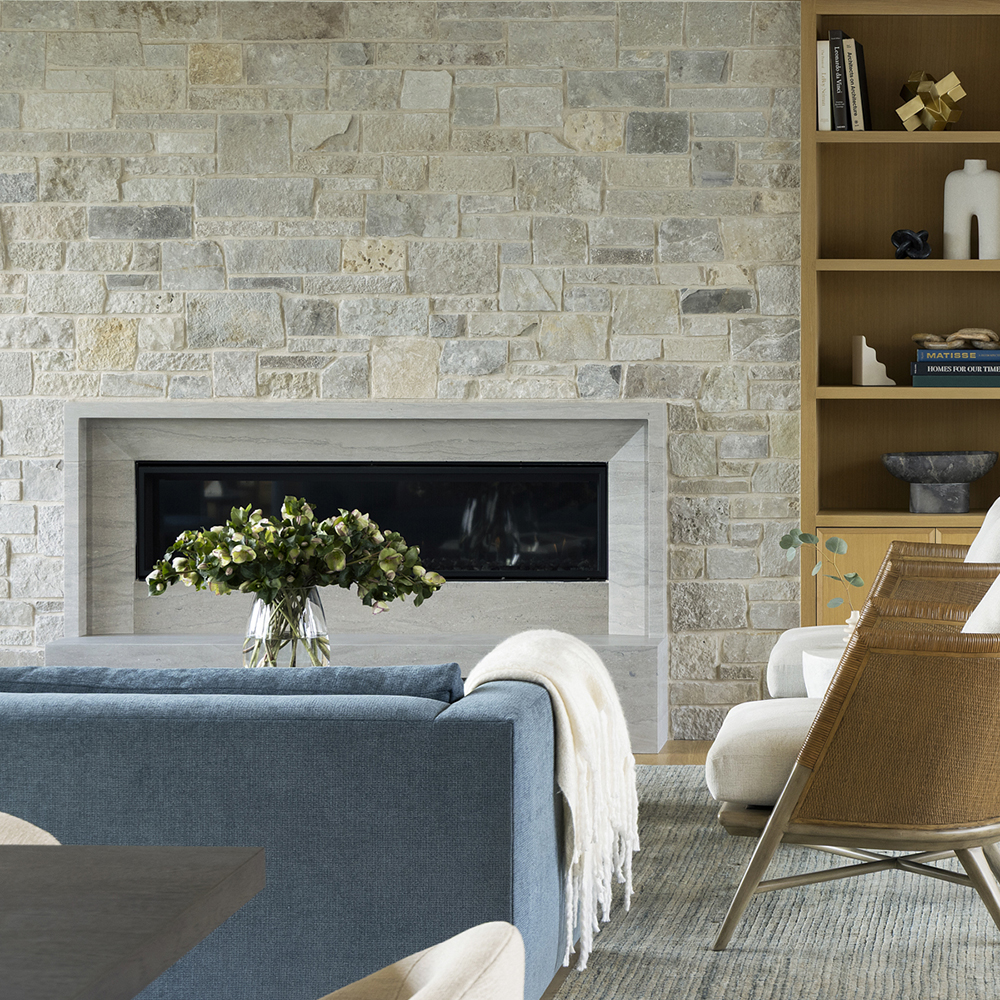 65. Custom Barone™ limestone vein-cut surround, with Oyster Bay veneer stone.