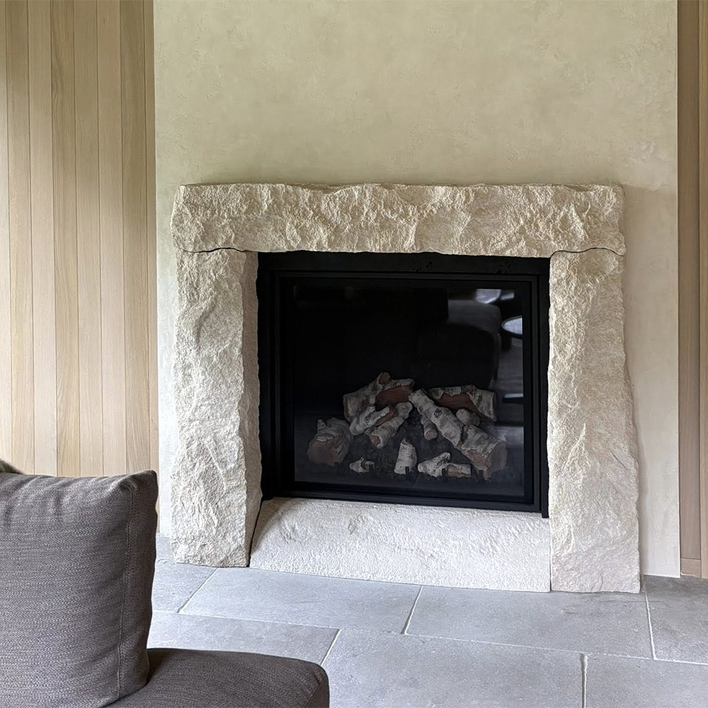 66. Handcrafted Pascal™ Limestone surround in our relic finish. Barone™ Limestone tile.